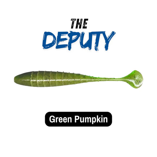 Green pumpkin-colored fluke fishing lure labeled 'The Deputy' on a white background